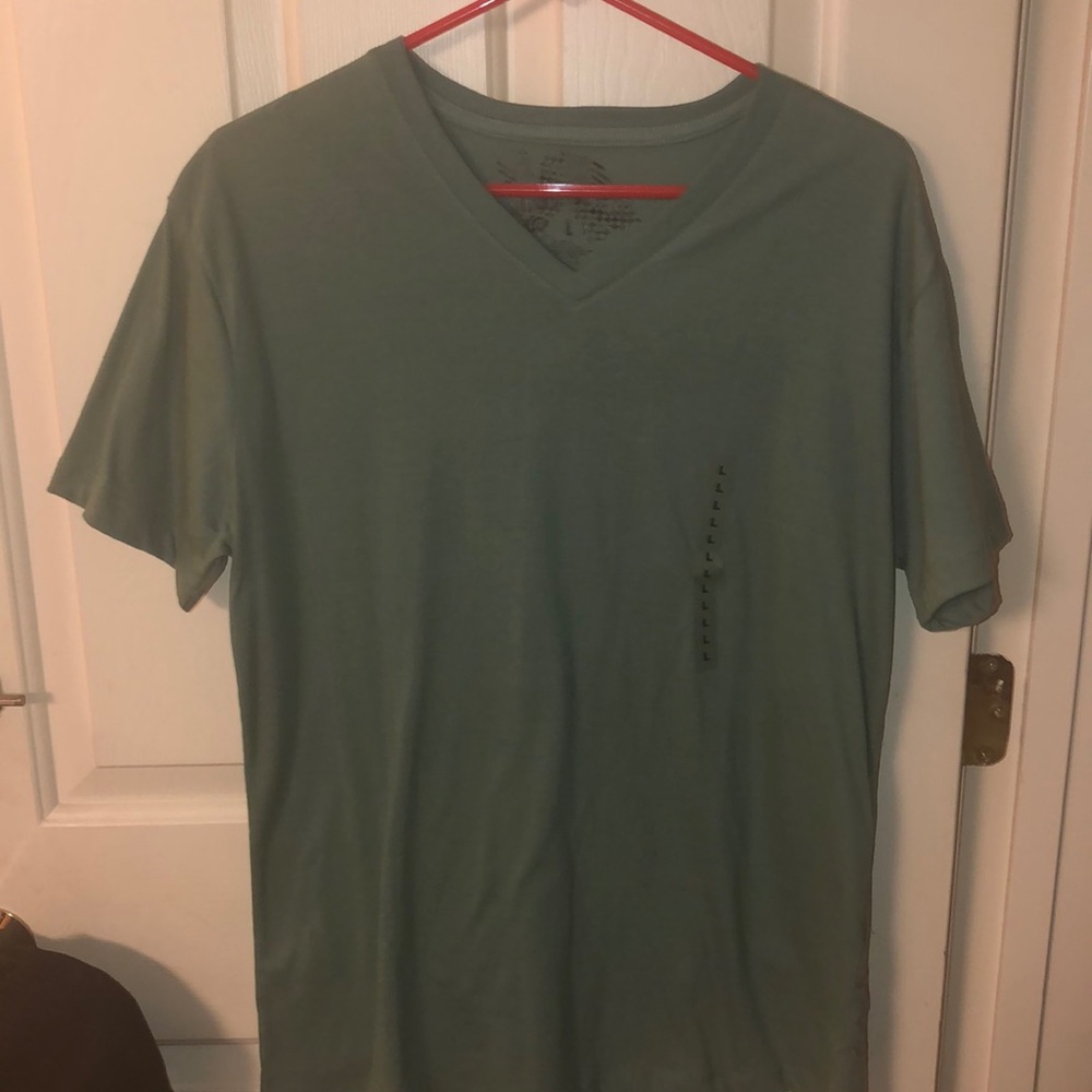 Brand new with tags on Men’s Blue Sol Shirt Size L